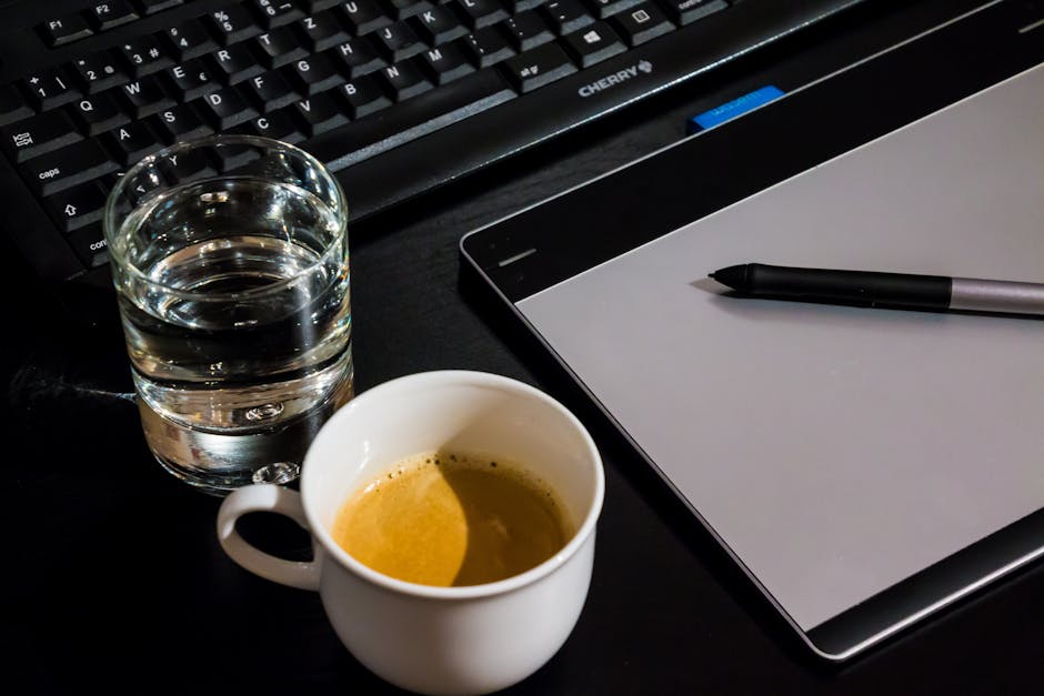 A person using a laptop to interact with AI technology indoors during the day.