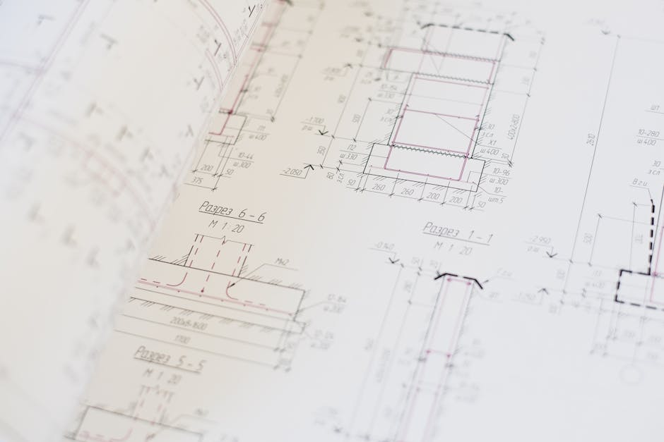 Close-up of a detailed architectural blueprint showcasing design and planning.