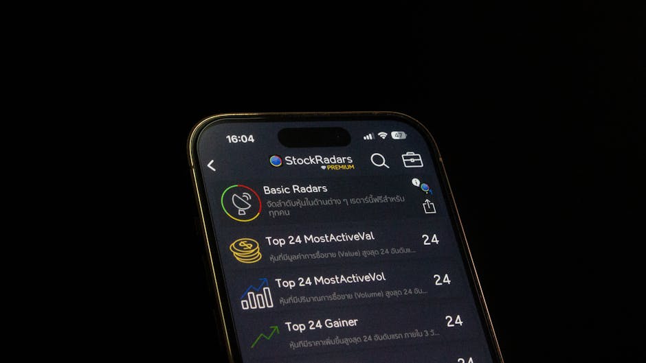 Close-up of a smartphone displaying a stock trading app interface, emphasizing financial analysis and investment insights.