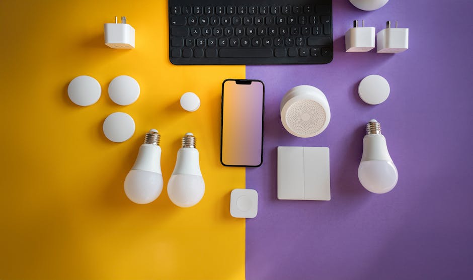 Flat lay of electronics, smart home gadgets on a colorful background for tech concepts.