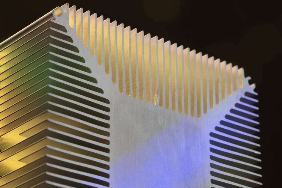 Detailed view of a metallic heat sink showcasing technological design.