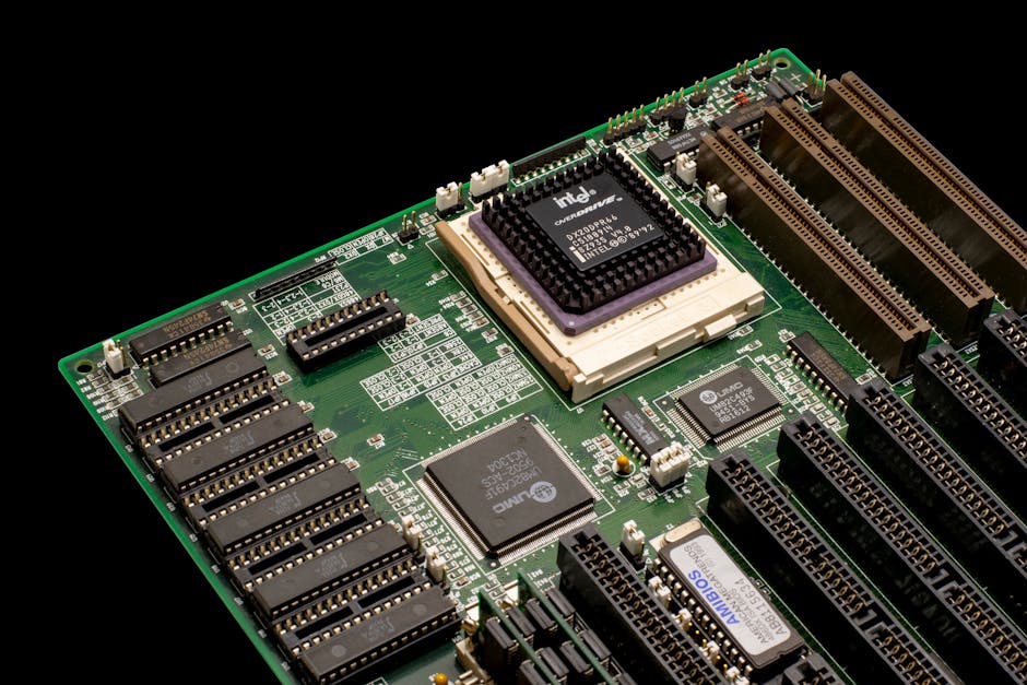 Detailed shot of a vintage motherboard showcasing microprocessor and electronic components.