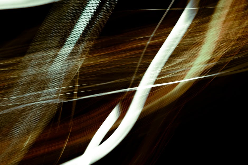 Intriguing abstract image of dynamic light trails with vibrant lines and striking textures.