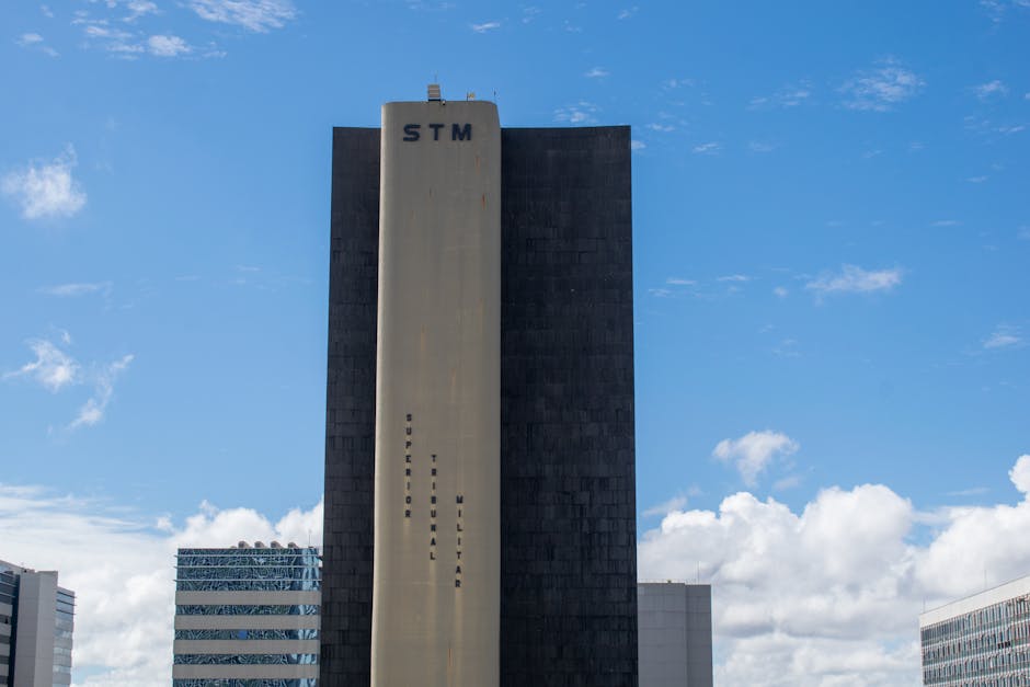 View of the Superior Tribunal Militar building in Brasilia, showcasing modern architecture under a clear blue sky.