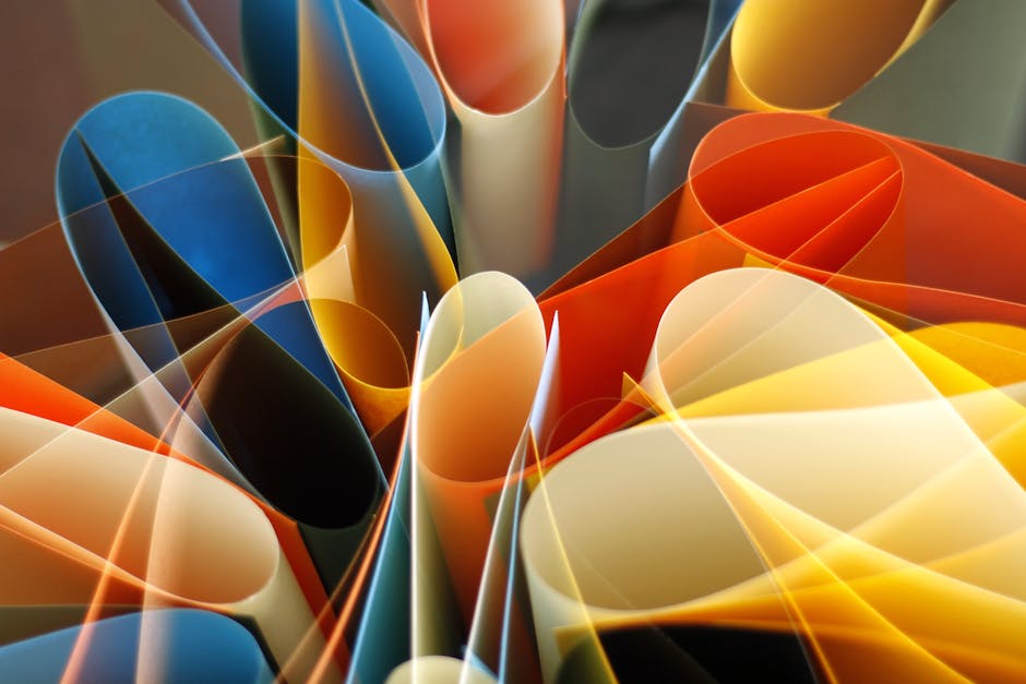 Vibrant abstract image of rolled colored papers creating a dynamic pattern.