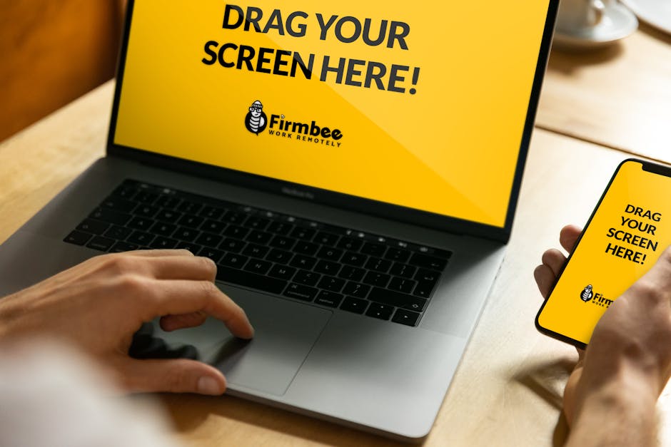 A diverse business team collaborates on projects in a modern office setting, using technology and notes.